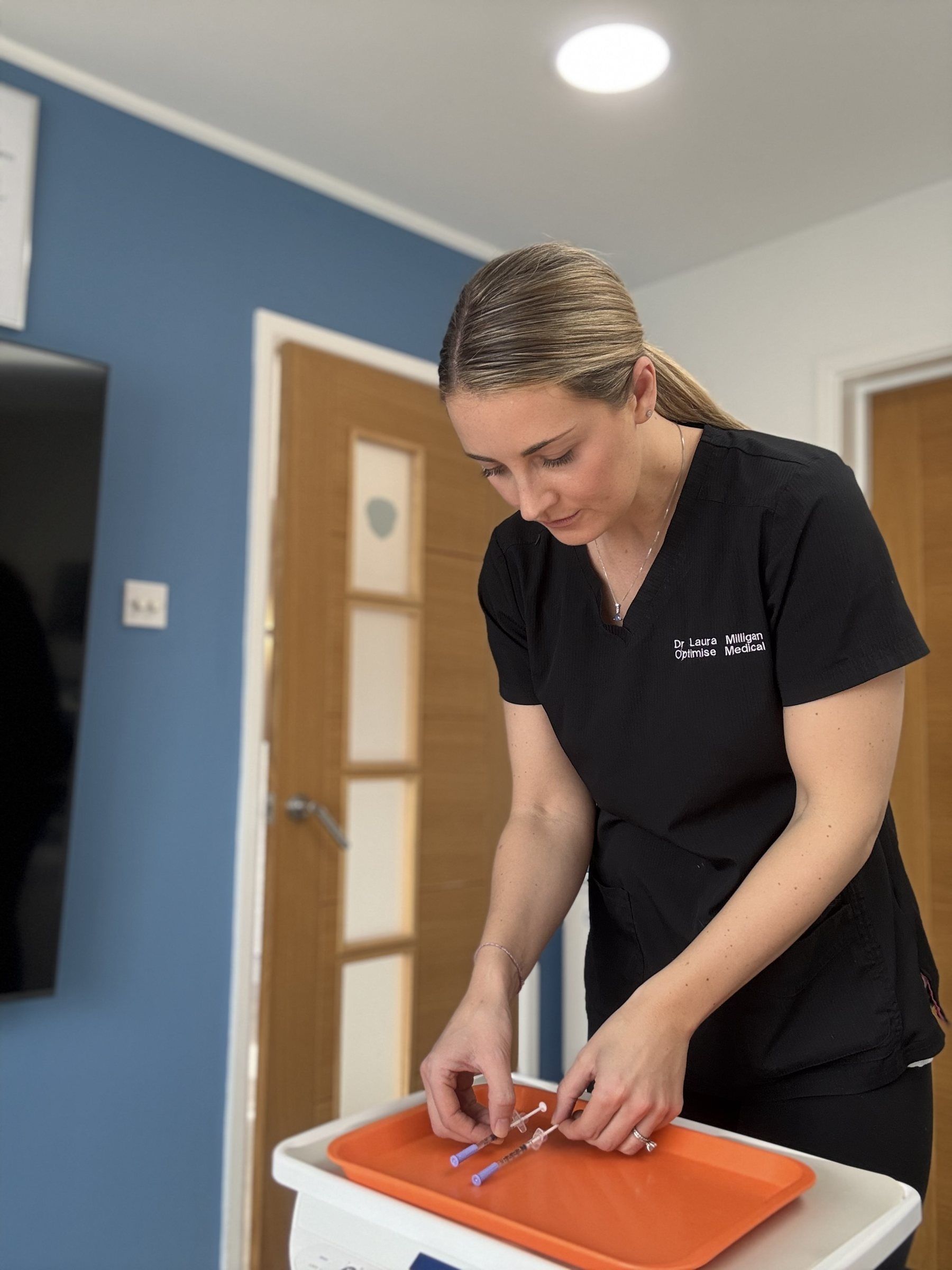 Dr Laura Milligan preparing for a treatment
